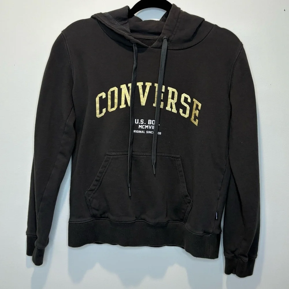 Converse Gold Standard Loose-Fit Pullover Hoodie in black with a gold logo.